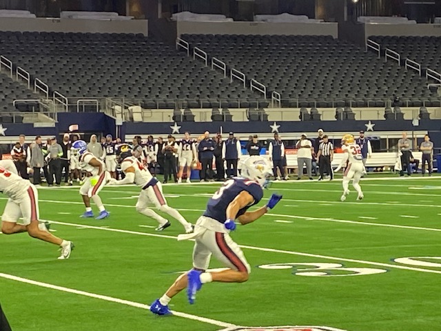 football Football players running from the line of scrimmage