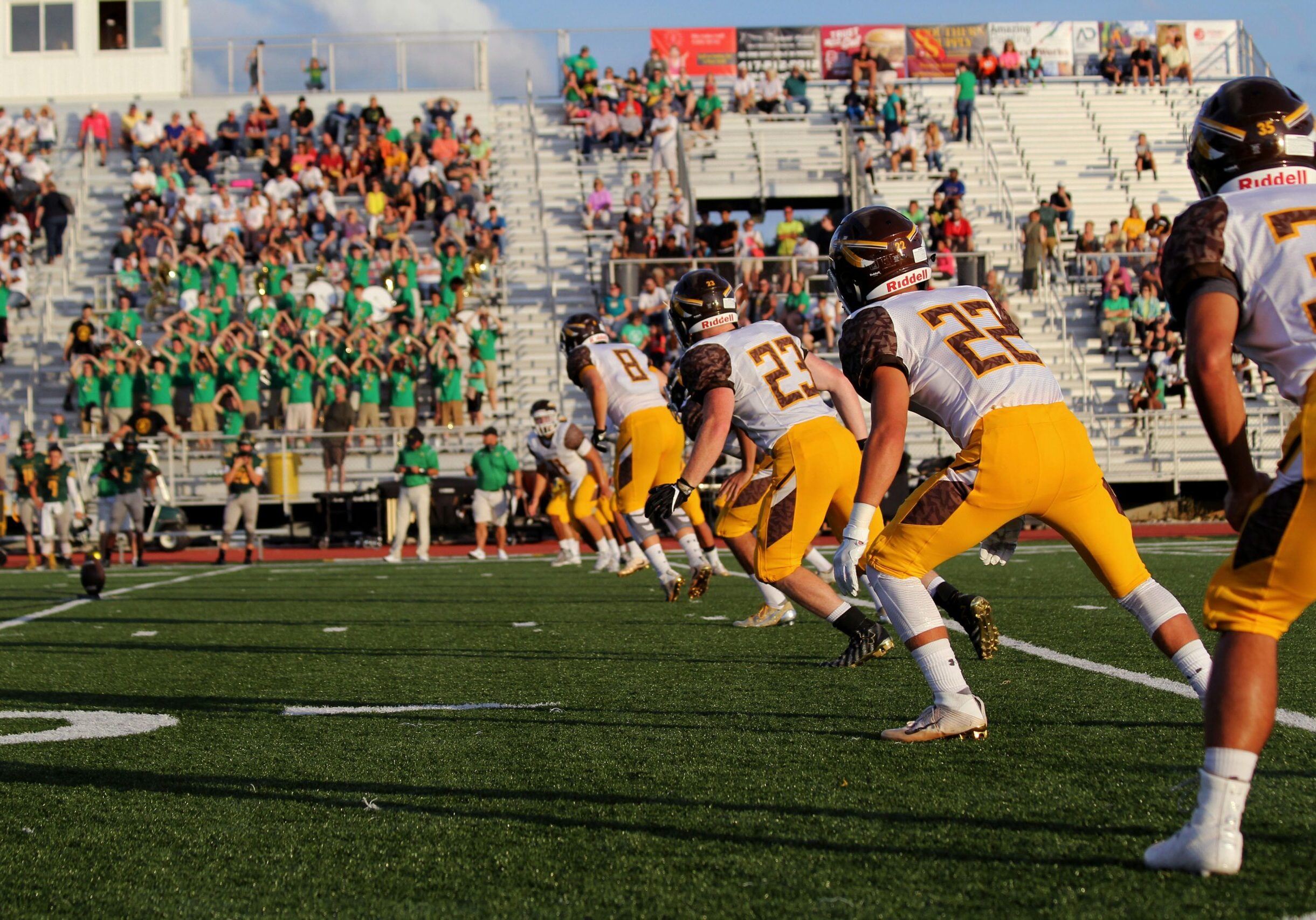 riley-mccullough-iezcEpGuYdE-unsplash A football punt return team lined up ready to punt the ball